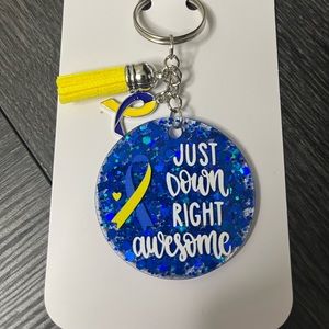 Hand crafted Down Syndrome awareness keychain with ribbon and color tassel